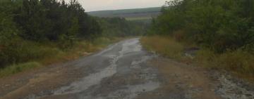 ФОТОФАКТ:  "убитый" участок дороги в Тарутинском районе