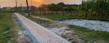 В селе Килийской громады появился новый тротуар и ремонтируют дорогу на центральной улице