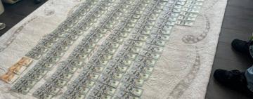 Килим із доларів: у медиків, які сприяли в отриманні групи інвалідності, вилучили майже 8 млн грн